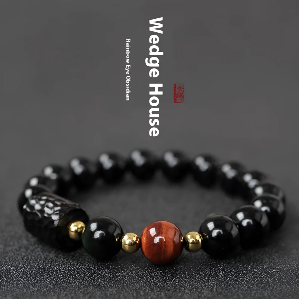 Obsidian bracelet with yellow tiger eye beads showing retro circular design