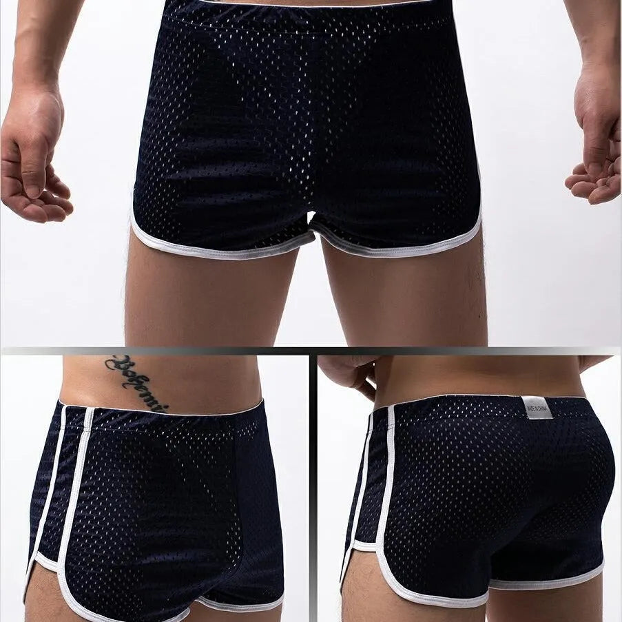 Men's three-point boxers in a cotton and nylon blend, shown in black, on a mid-waist fit model.
