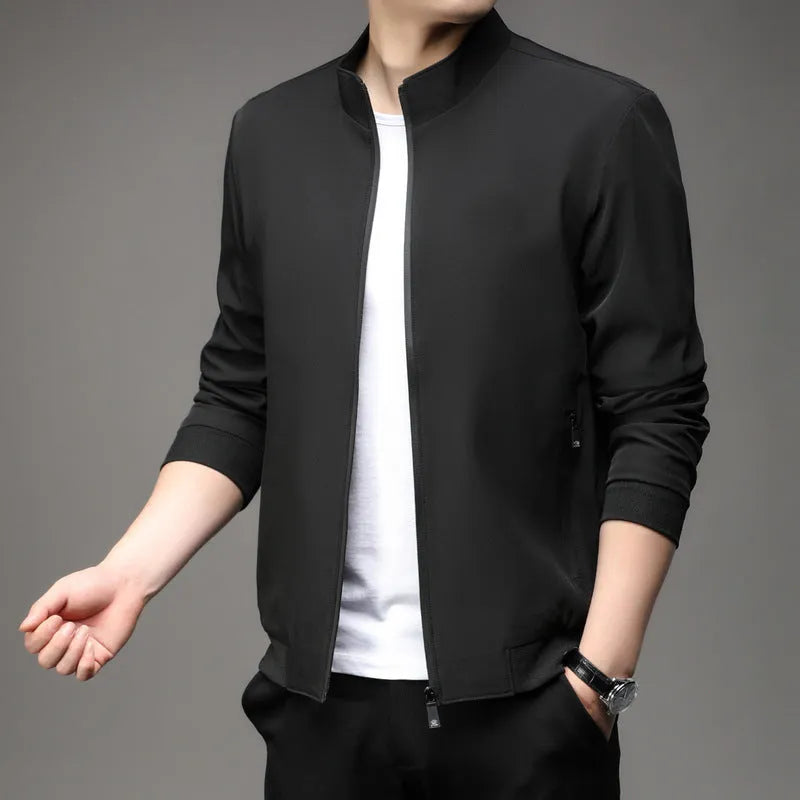 Men's Korean style loose lapel casual jacket in blue with zipper pockets.