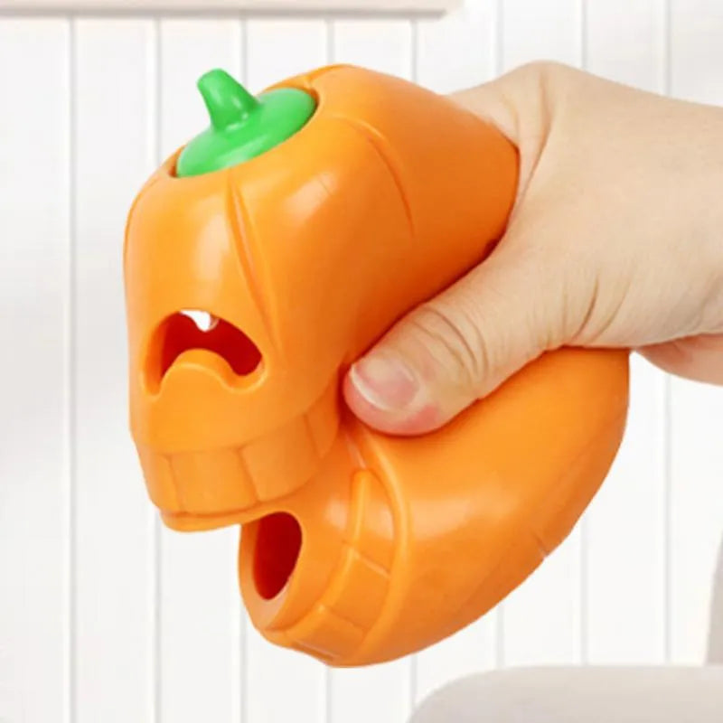 Yellow TPR pumpkin-shaped durable dog chew toy for aggressive chewers