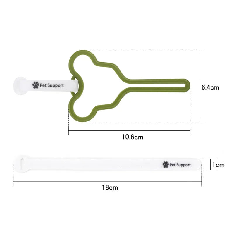 A hands-free dog poop bag holder with a black plastic clip and adjustable velcro strap, loaded with green waste bags.