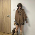 Women's triangular cashmere blend shawl cape with tassel trim in multiple colour options