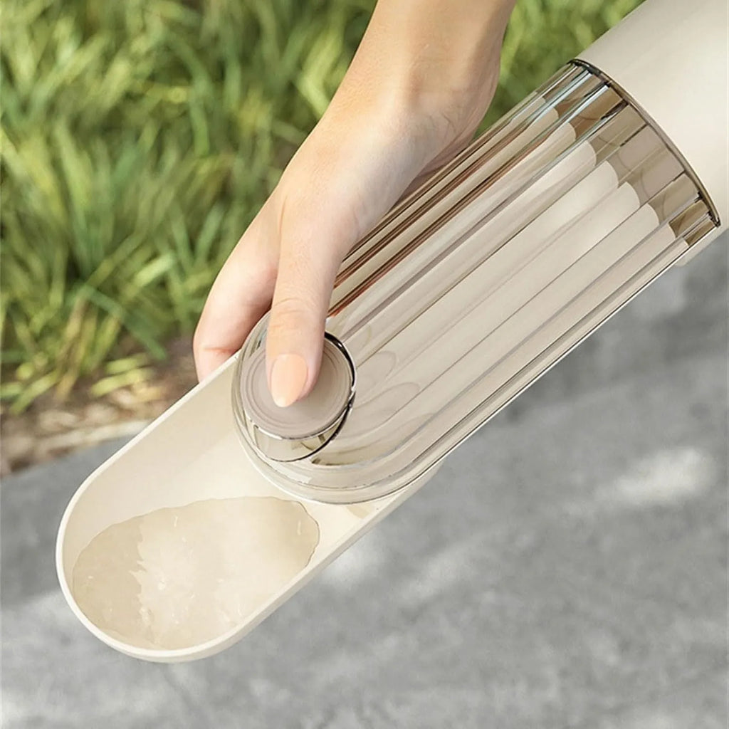 Beige and green foldable leak-proof dog water bottle with food container for outdoor use