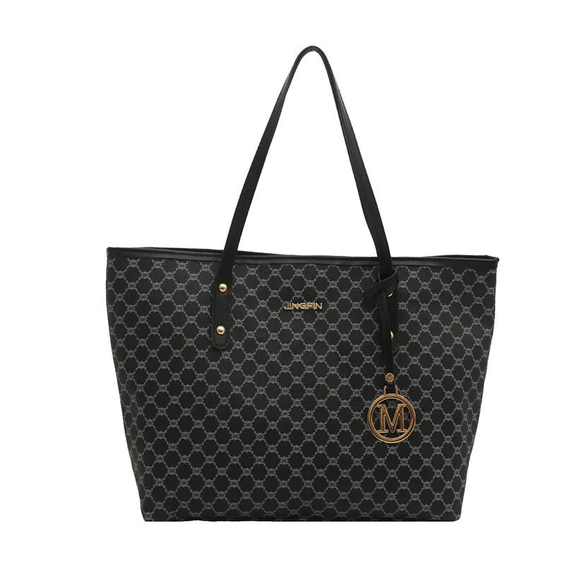 Women's western style PU leather shoulder bag in black showing visible sewing thread details.
