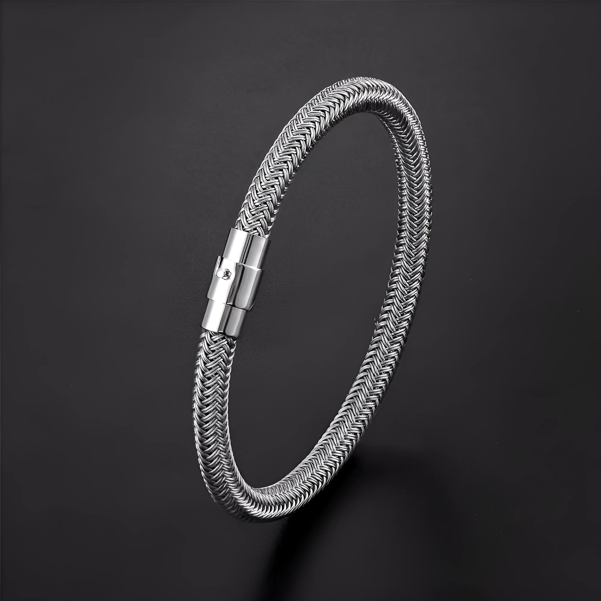 Men's titanium steel geometric bracelet with a magnetic clasp shown in one of four available colour finishes.
