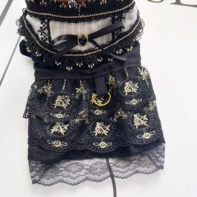 Golden gothic princess style skirt dress for a small dog on a mannequin, showing the skirted design.