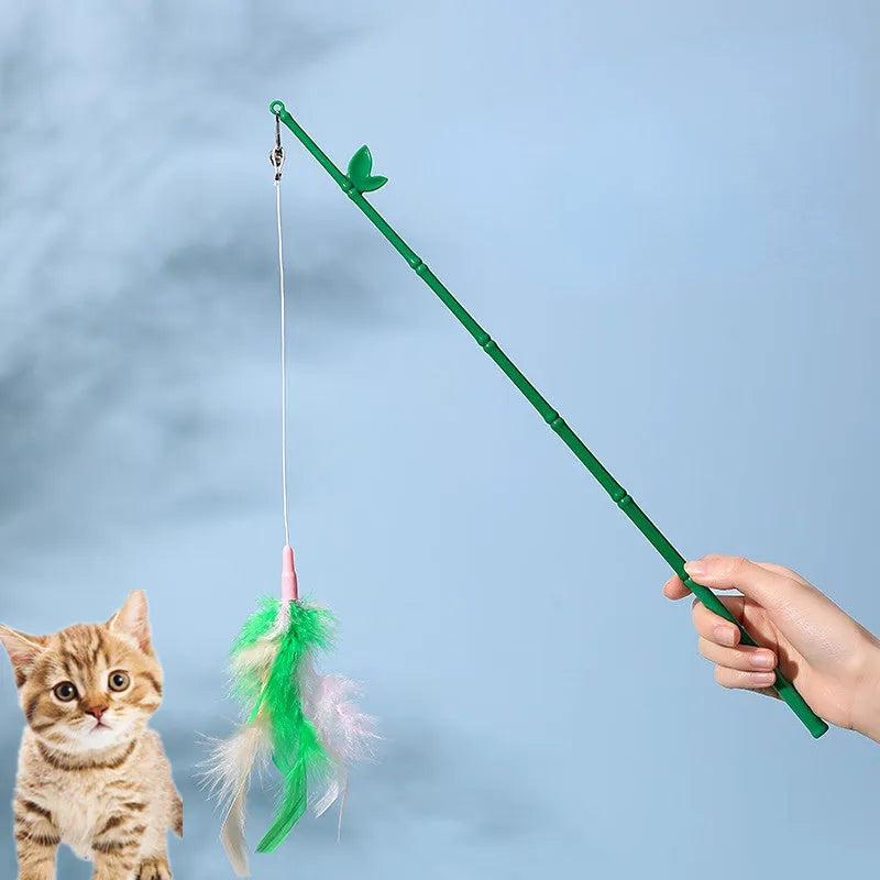 Green interactive cat feather wand toy with bells and a comfortable grip handle
