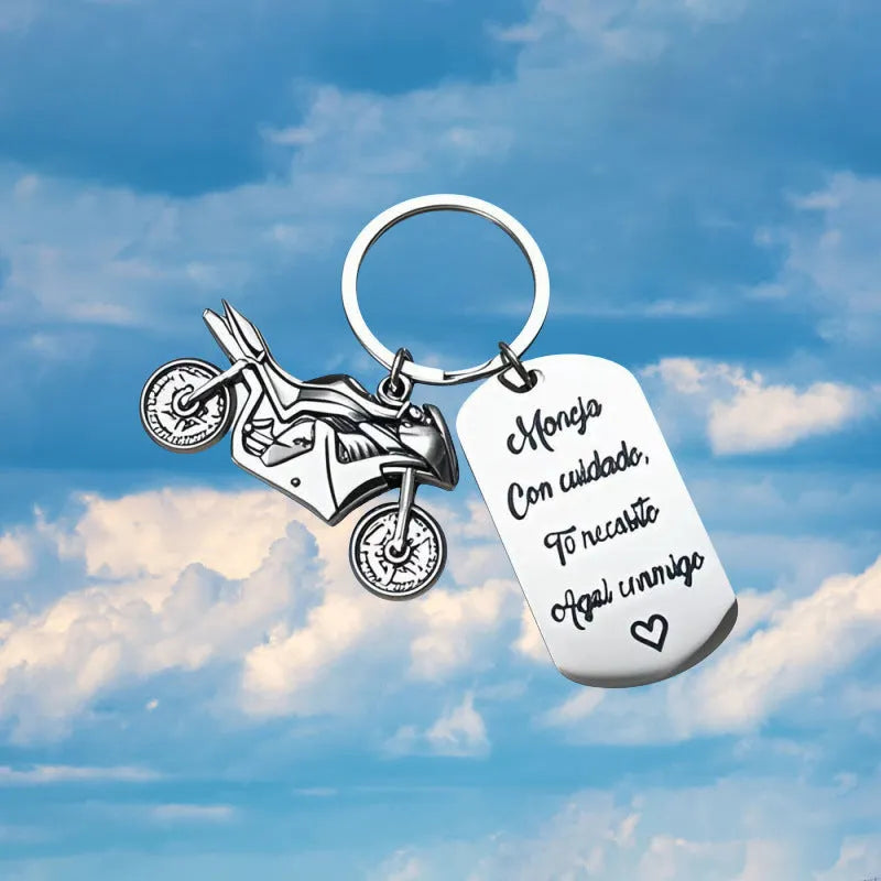 Stainless steel motorcycle keychain with modern design and included flannel gift bag.