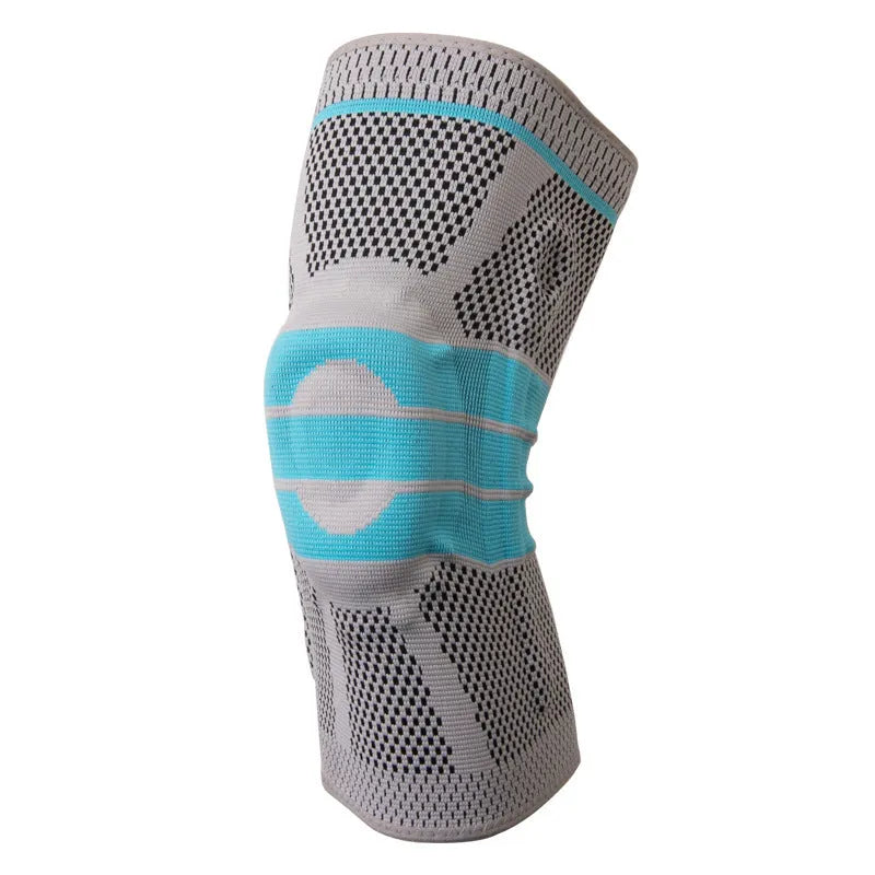 Sky blue elastic fibre knee pad with silicone grip for sports, shown in S, M, L, XL sizes.