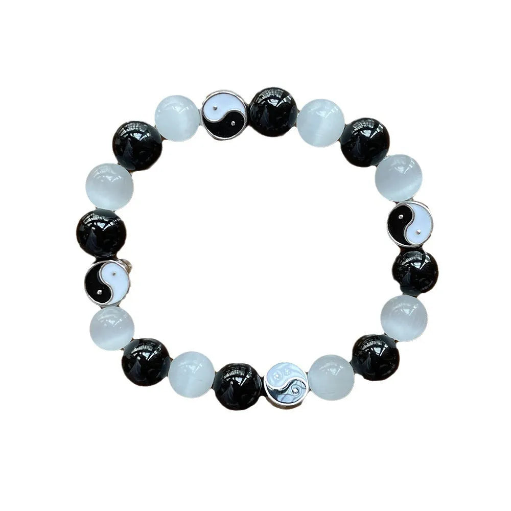 Natural stone Tai Chi bracelet with 10mm polished opal and black agate beads, unisex design
