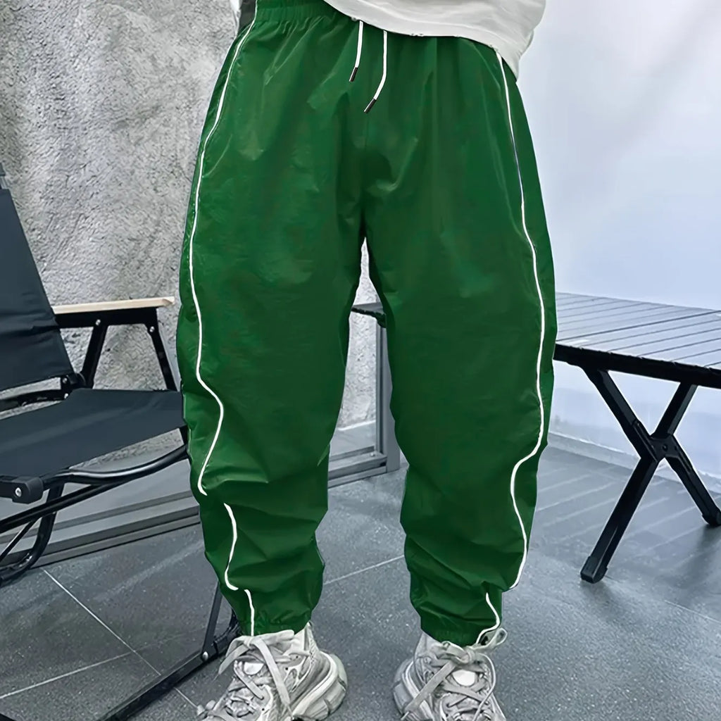Men's loose fit bamboo fibre cropped sports trousers in Army Green colour.