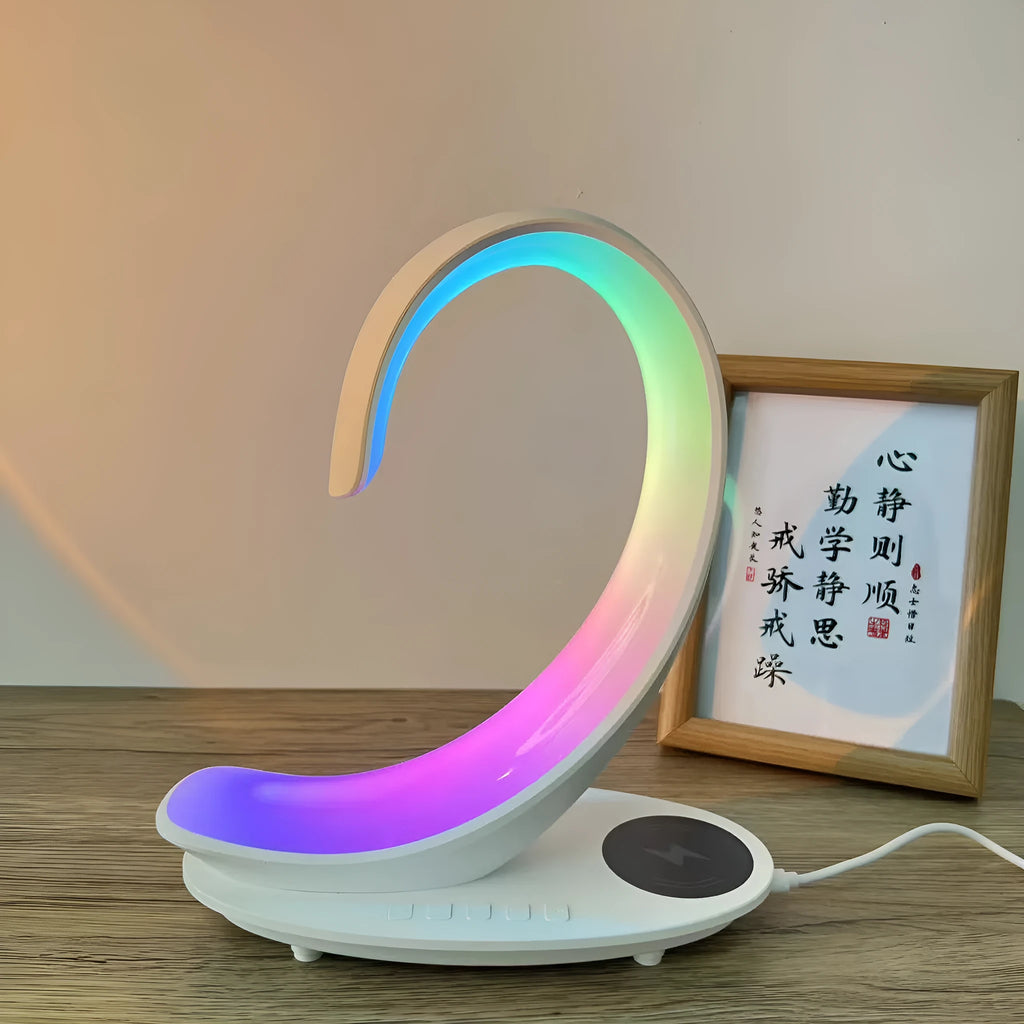White Swan animal sculpture desktop wireless charger with Bluetooth speaker and colourful LED mood lighting