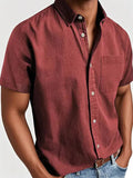 Men's solid colour short-sleeved shirt with a polo collar and a chest pocket.