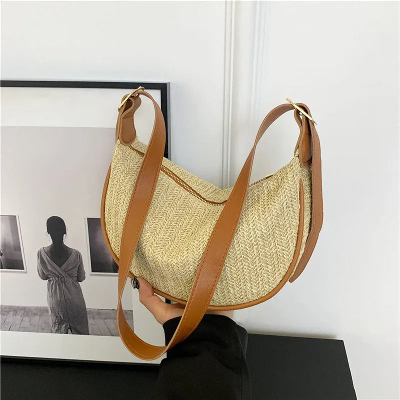 Women's woven straw crossbody bag showing internal phone and document pockets in corrugated brown colour