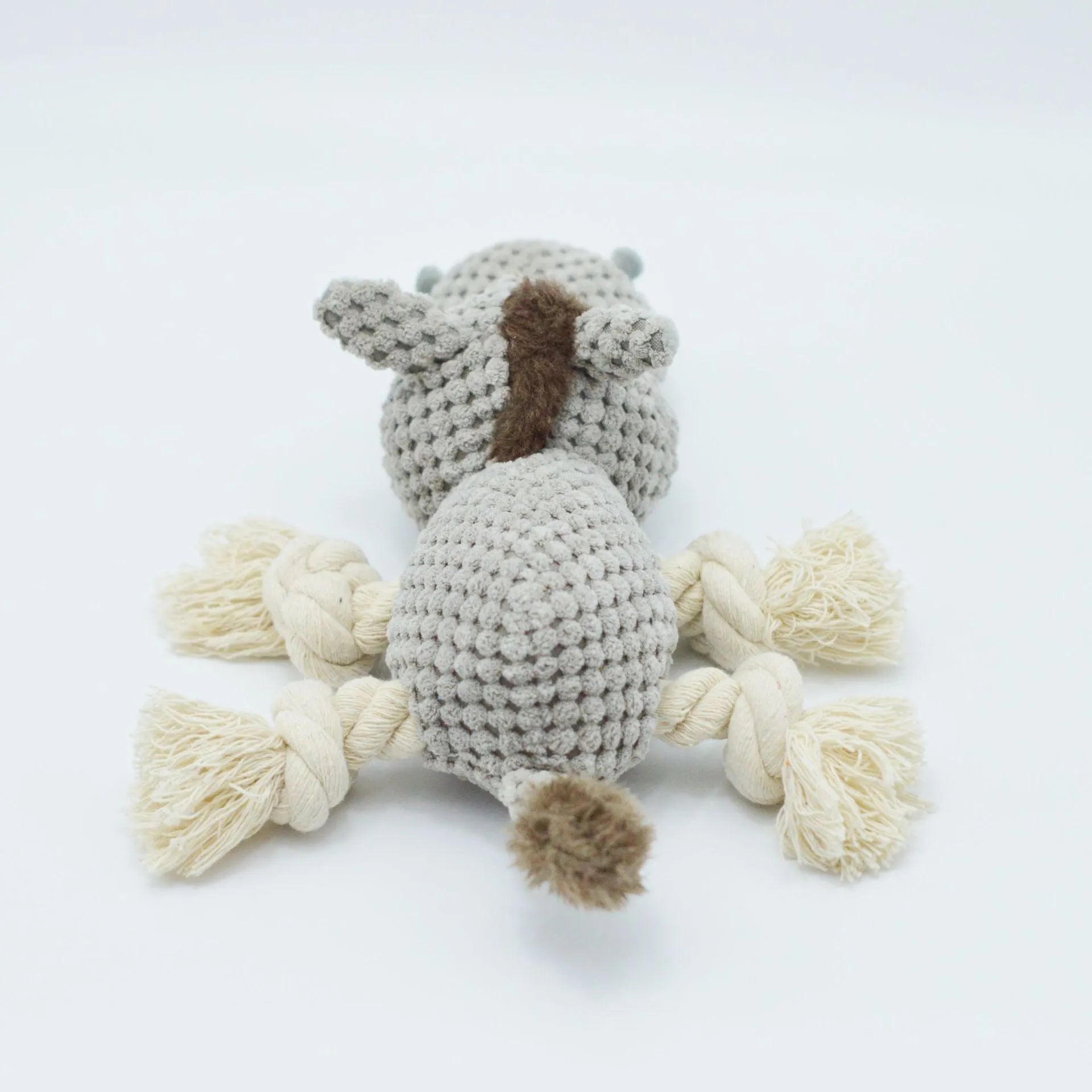 Grey donkey plush dog toy with creaking sound mechanism