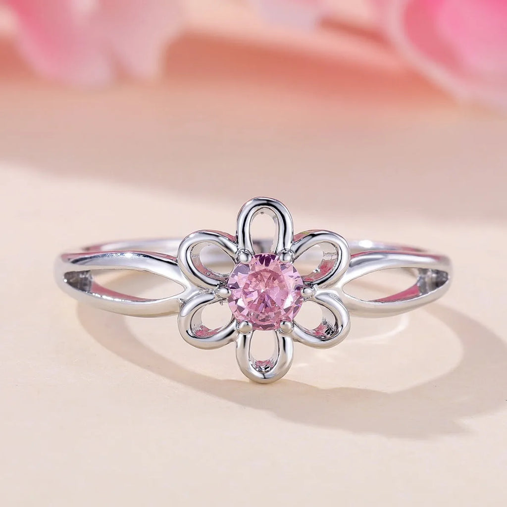 Women's hollow flower fashion ring in electroplated copper with floral design