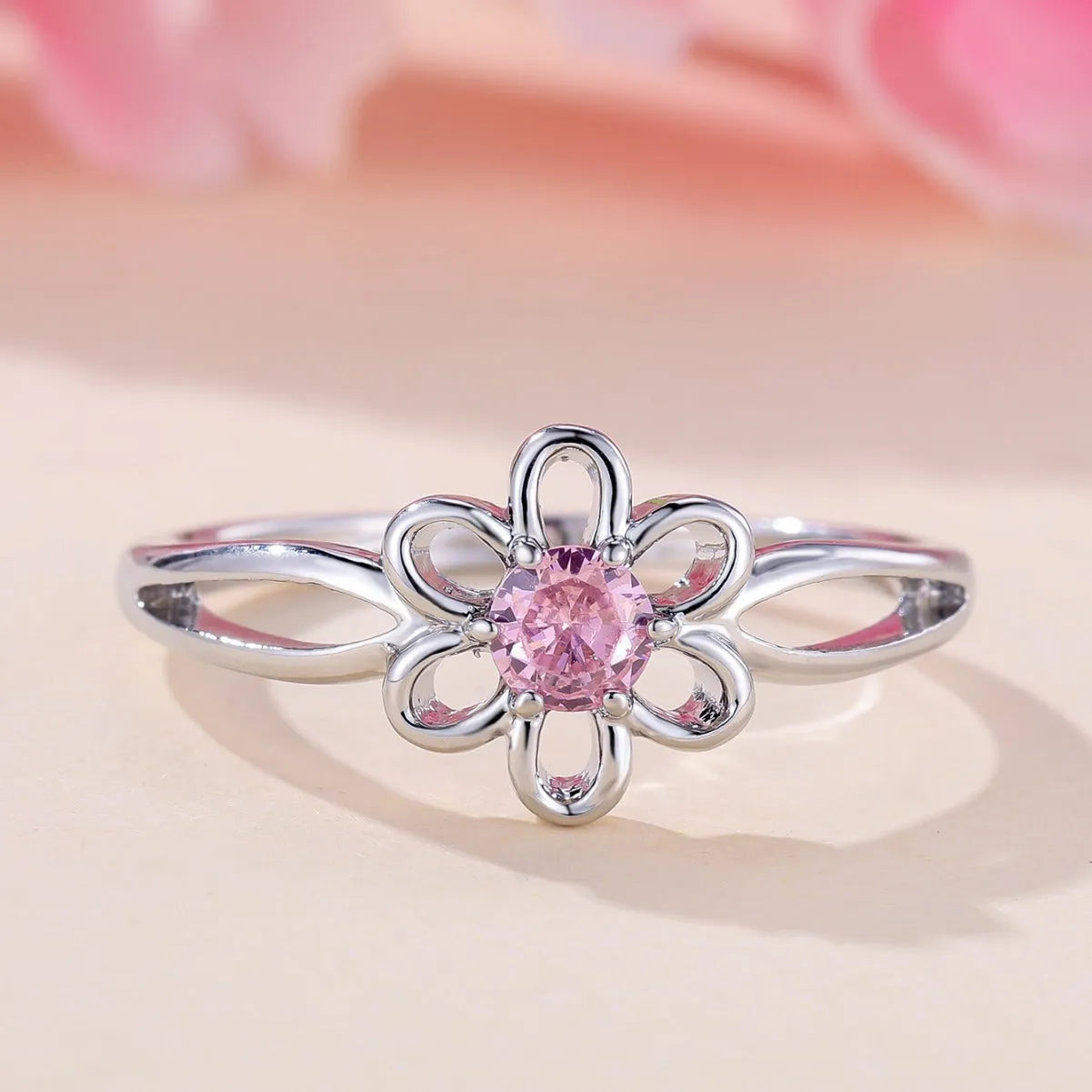 Women's hollow flower fashion ring in electroplated copper with floral design