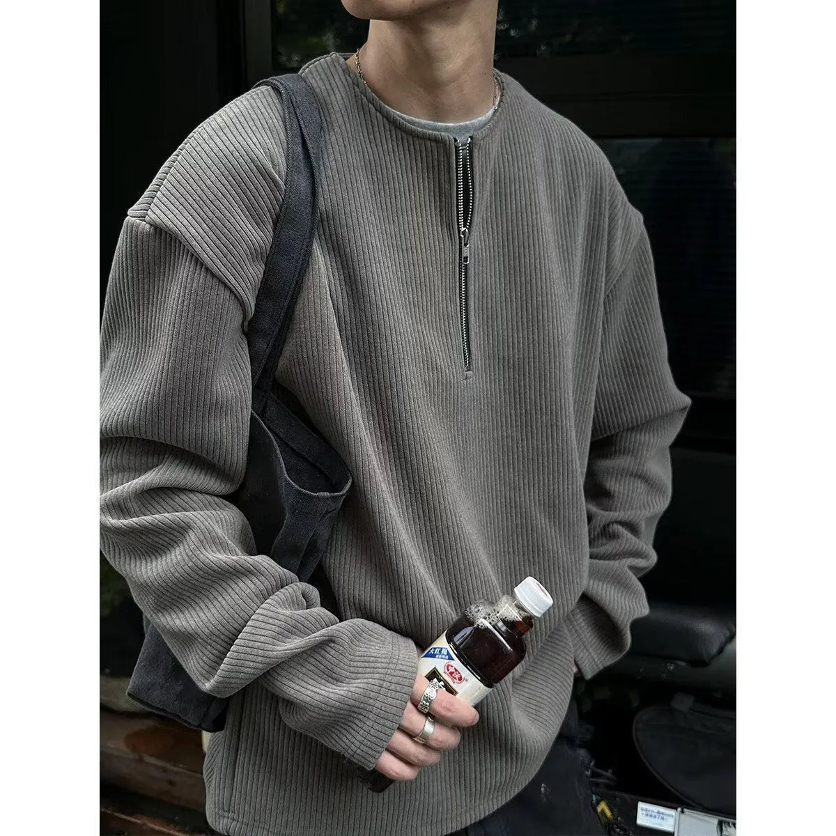 Grey loose-fit long sleeve polyester pullover top for early spring
