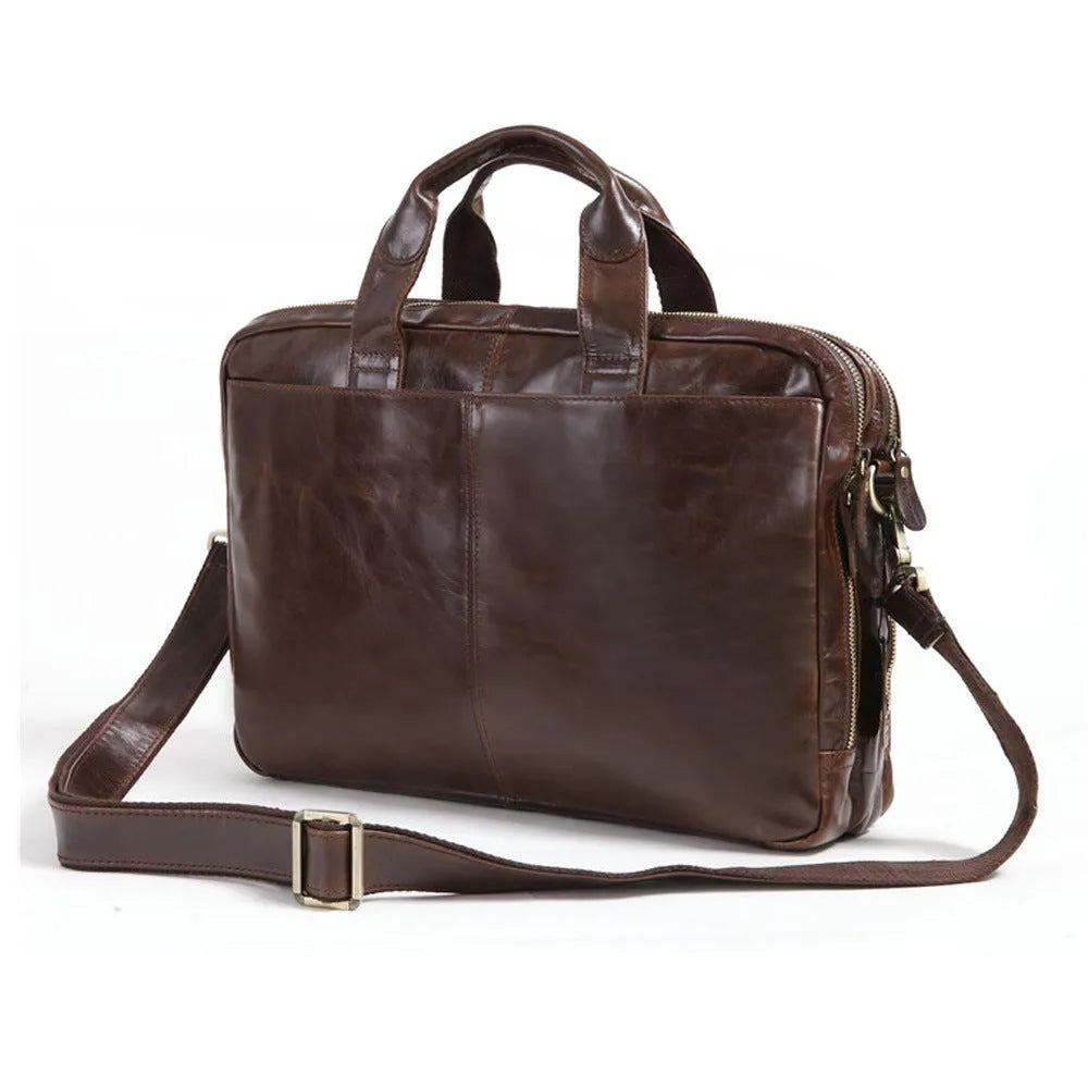 Brown leather business briefcase with visible cowhide pattern, measuring 18 inches with internal polyester cotton lining