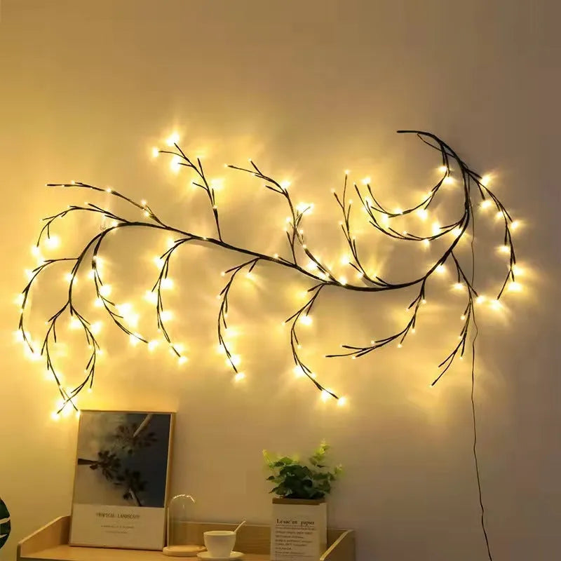 Flexible willow vine Christmas garland with birch bark texture and warm white LED lights extended along wall