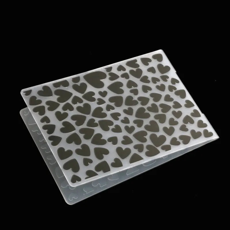 Plastic folding cake decorating mould showing windmill and five-pointed star design options