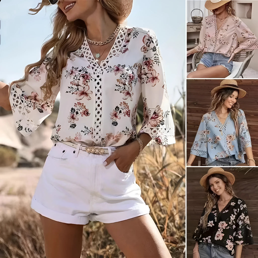 Loose V-neck pullover top with bell sleeves, lace trim, and printed pattern in white