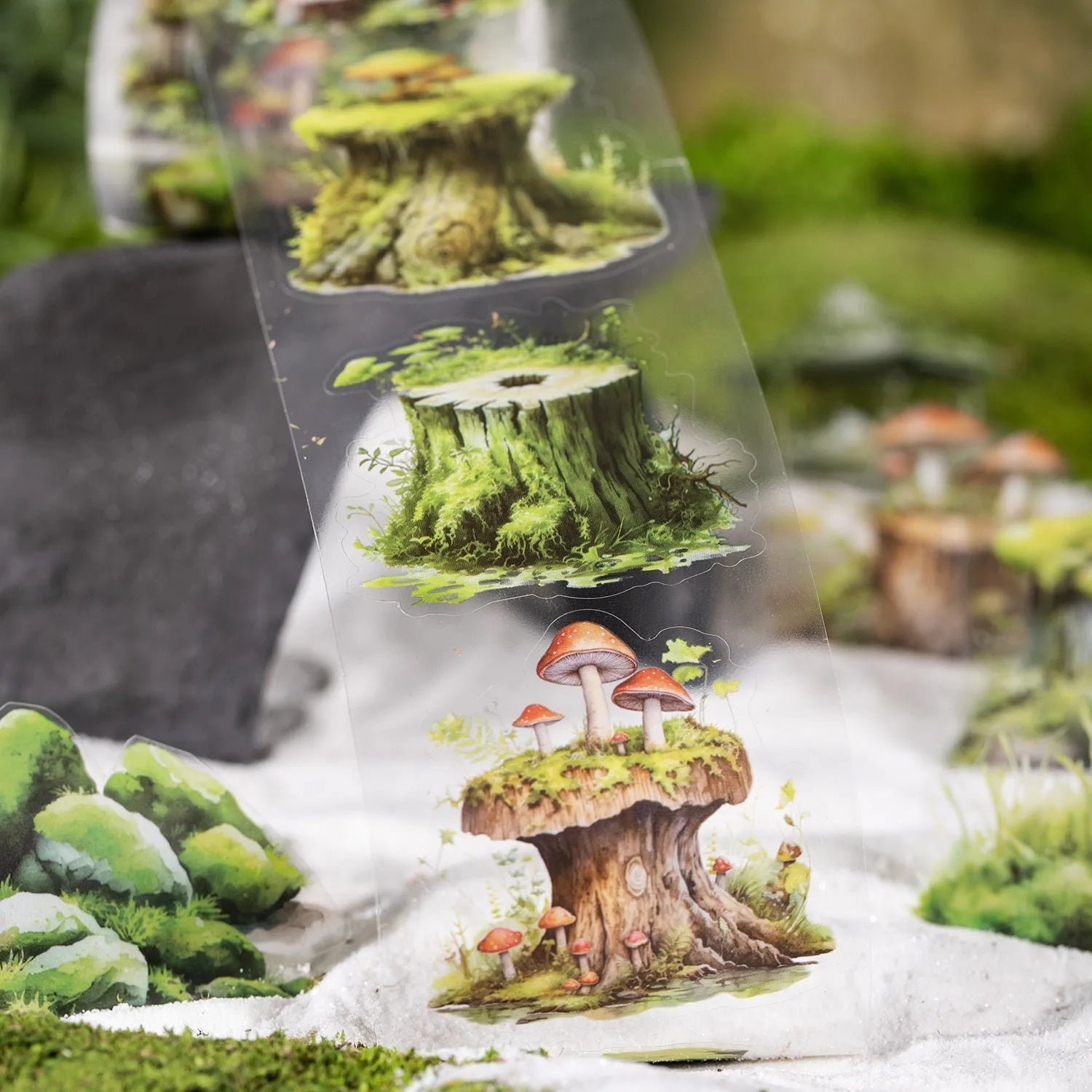 Forest Moss Series DIY decorative sticker set with PEt tape rolls, artificial moss pieces, wooden decorations, and small metal ornaments on a white background