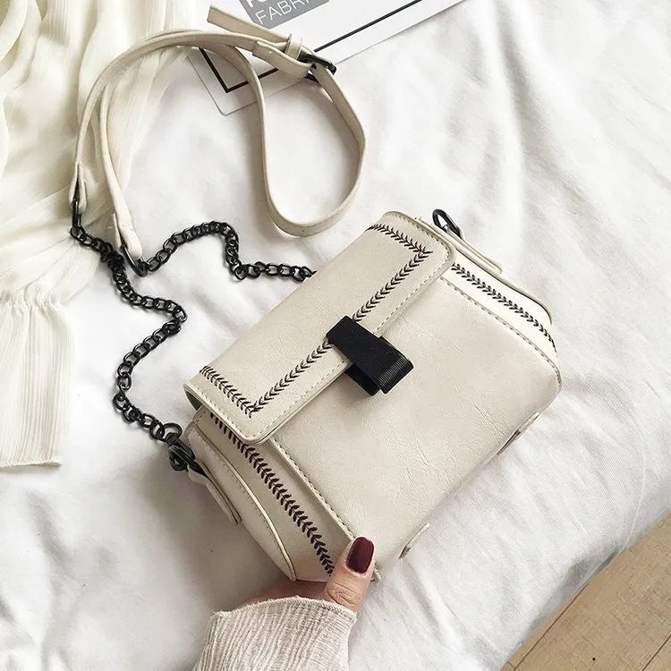 Korean-style PU shoulder crossbody bag in beige with clamshell opening and horizontal square shape