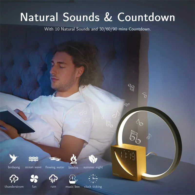 Navy blue touch control bedside lamp with digital alarm clock display on wooden table