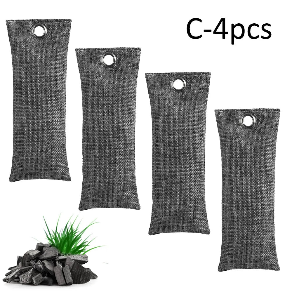 Black, green, grey, and blue bamboo charcoal deodoriser bags for shoes and household odour absorption.