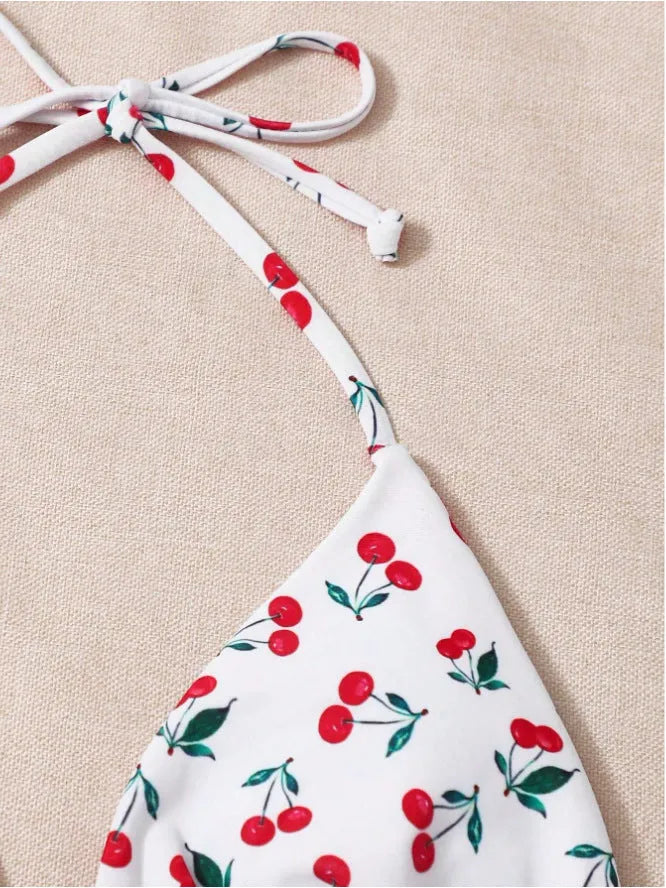 Women's holiday split halter bikini swimsuit in Picture Colour with backless design