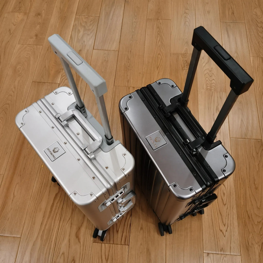 Aluminium magnesium alloy striped luggage suitcase in metallic blue colour showing hard-shell construction