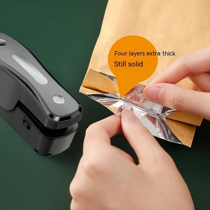 Small USB rechargeable portable sealing machine for kitchen food preservation
