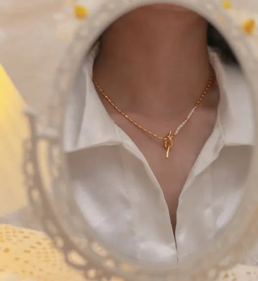 Gold copper natural real pearl necklace with geometric ring and line cold style pendant on woman