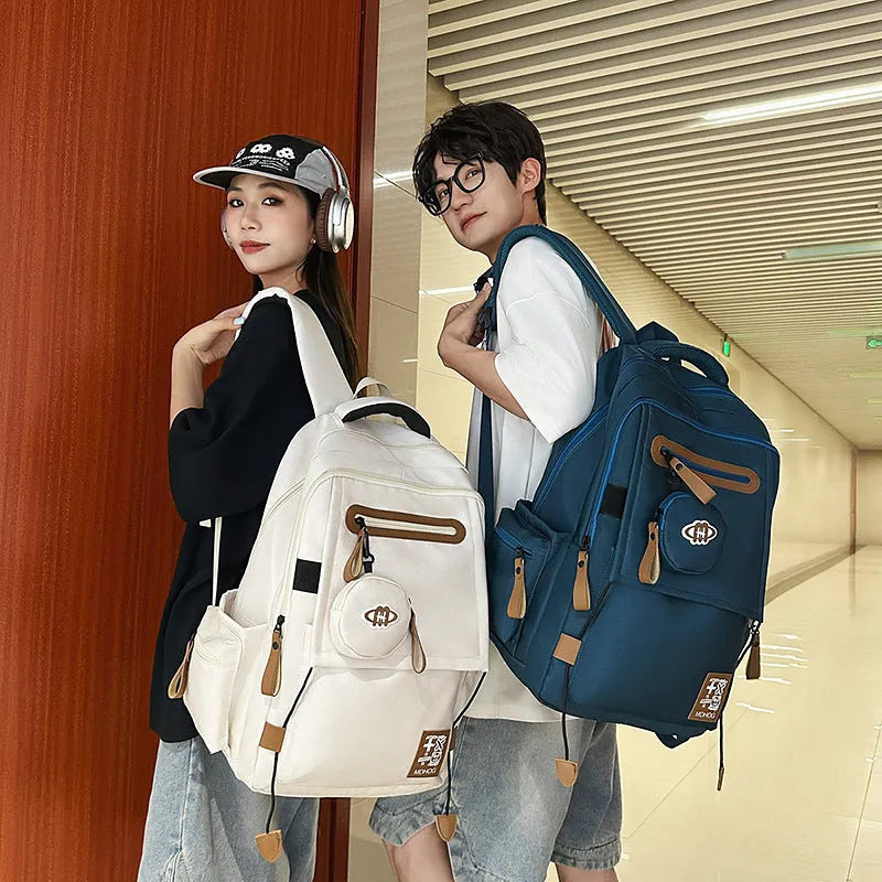 Japanese leisure travel backpack in black with contrast stitching and 20-35 litre capacity