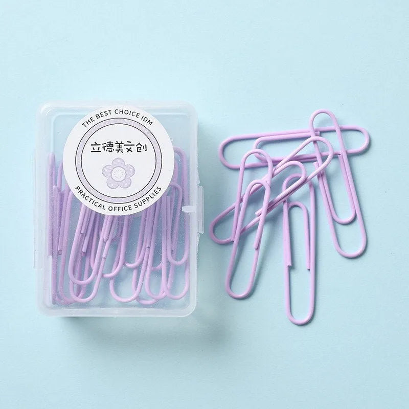 Set of macaron colour alloy paper clips in pink, green, and purple, showing 28mm and 50mm sizes, on a light background