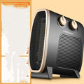 White electric fan heater with mechanical control dials on a dark background.