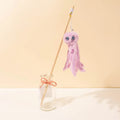 Colourful plush octopus cat toy attached to a long stick for interactive play.
