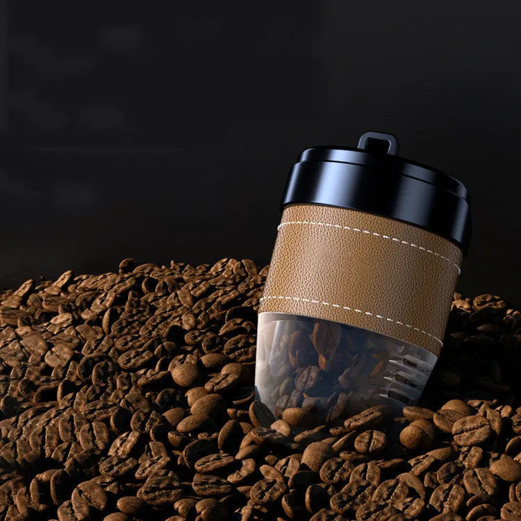 Coffee cup shaped car perfume air freshener in five colour options on car dashboard