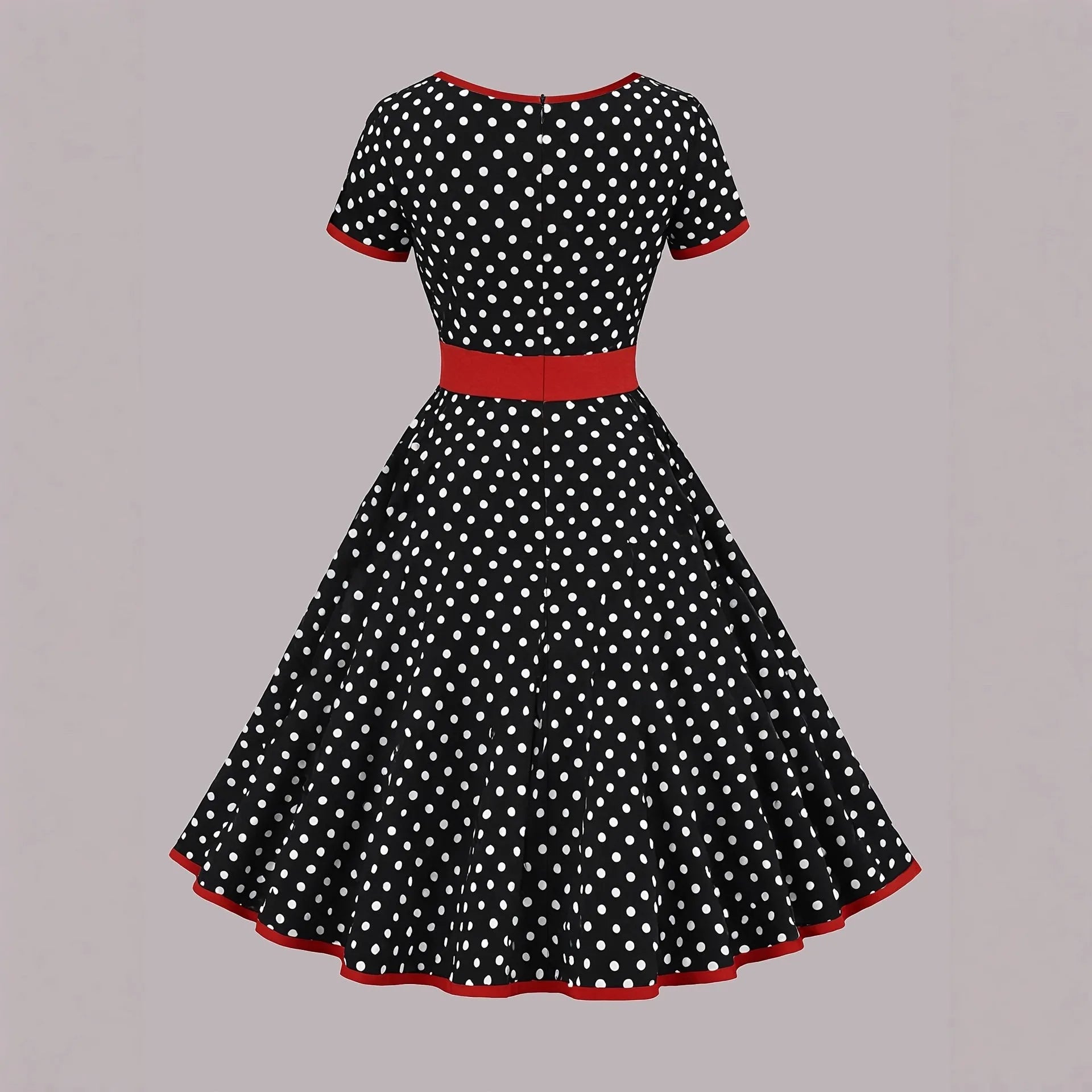 A women's polka dot pleated dress with a square collar and zip closure.