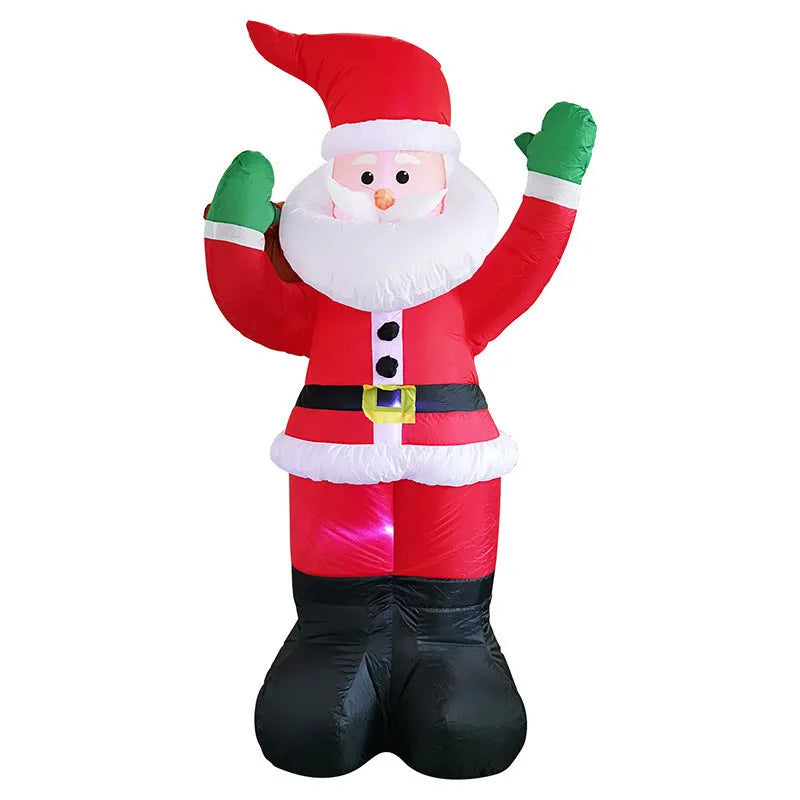 Glowing LED inflatable Christmas decorations including Santa, snowman, and a Christmas tree for outdoor garden use.