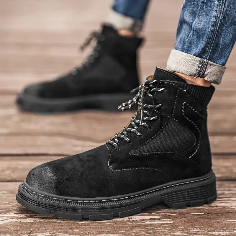 Men's vintage Martin boots in black with a round toe, low thick heel, and rubber sole.