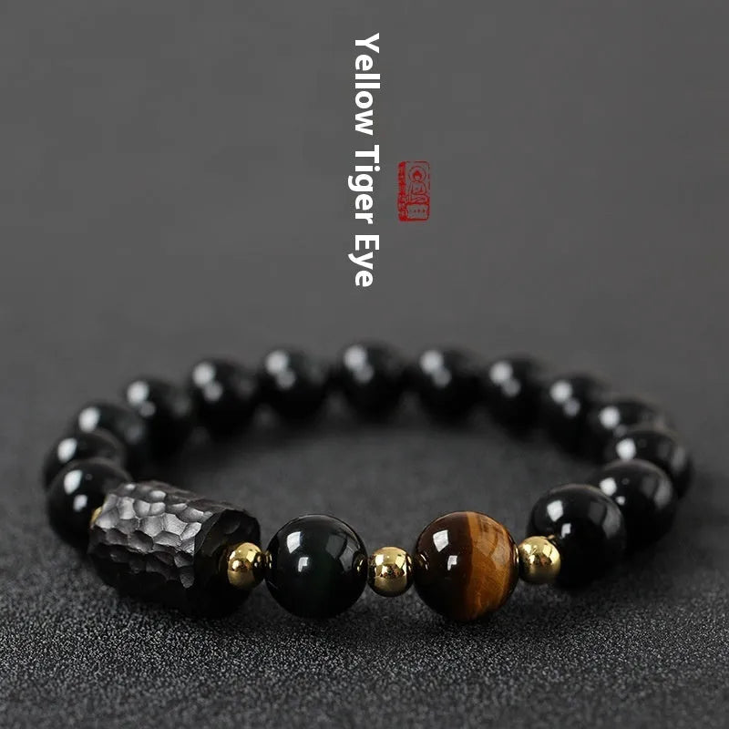 Obsidian bracelet with yellow tiger eye beads showing retro circular design