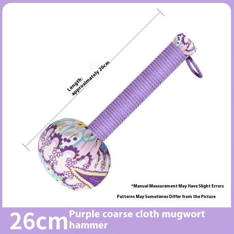 Argy wormwood handheld massage hammer in green colour on a plain background