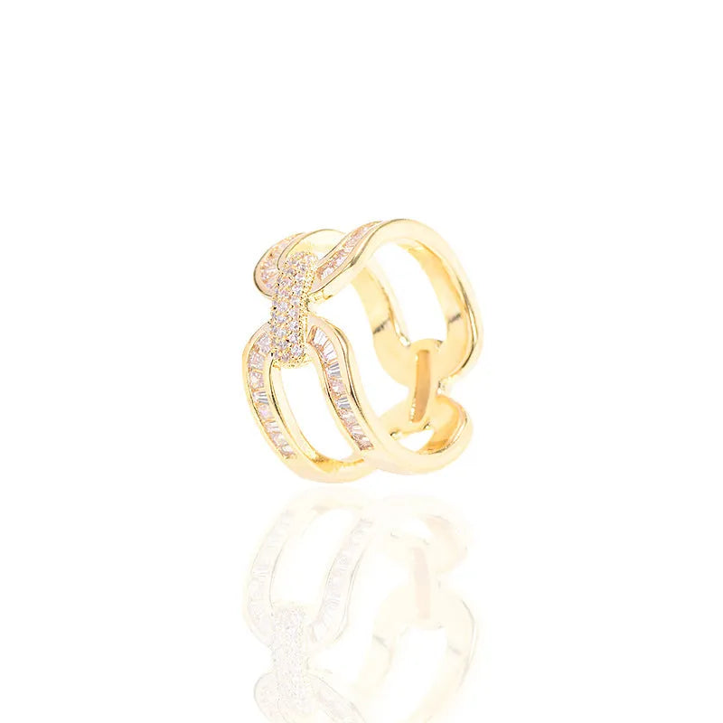 Round copper scarf ring with gold electroplated finish and geometric shape for securing scarves