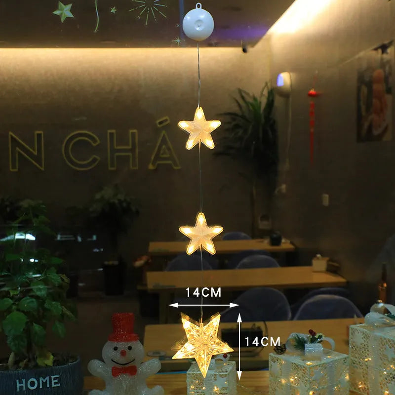 Christmas window lights with star-shaped LED pendants and suction cups for battery-operated festive decoration