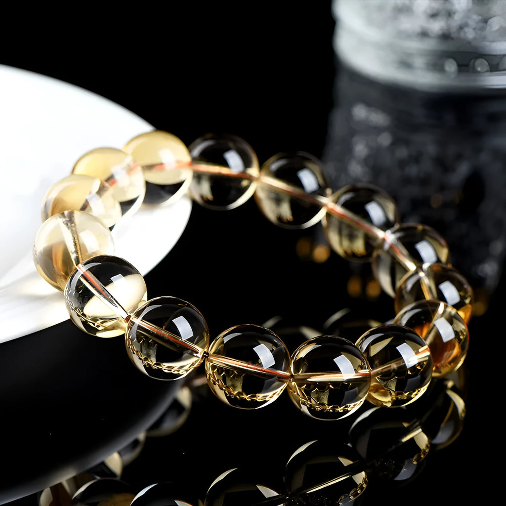 Natural citrine scattered beads ball bracelet showing polished beads on a bracelet base.