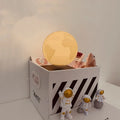 Maglev floating planet night light with astronaut figurines and LED illumination