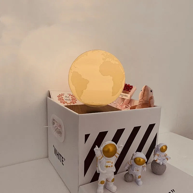 Maglev floating planet night light with astronaut figurines and LED illumination