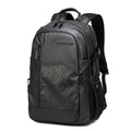 Casual plaid computer backpack in blue with curved shoulder strap showing 18-inch laptop compartment